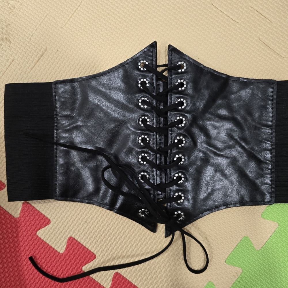 Black elastic lace-up cinch corset belt" or "Wide waist lace-up corset belt.